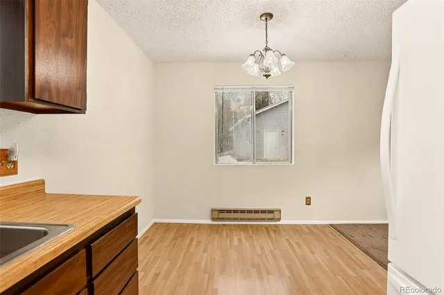 a view of kitchen and utility room
