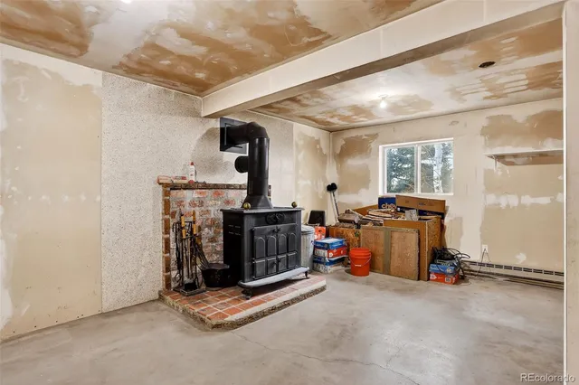a view of livingroom with furniture and fireplace
