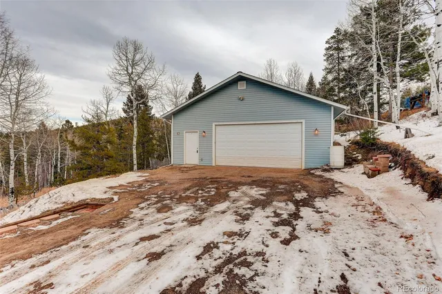 a view of a room with wooden walls