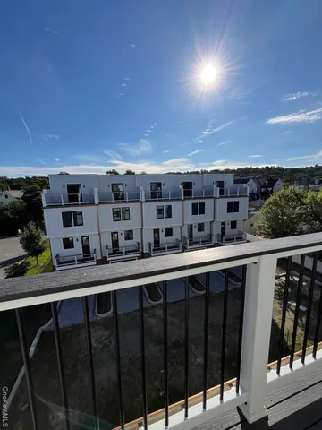 a view of a balcony with city view