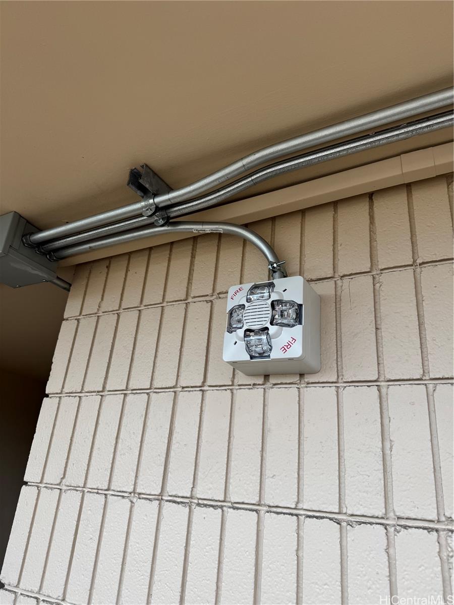 3215 Ala Ilima Street, Unit B909 Honolulu, HI 96818 - Photo 21 of 23 New alarm system in place for fire in Entire building and each unit.