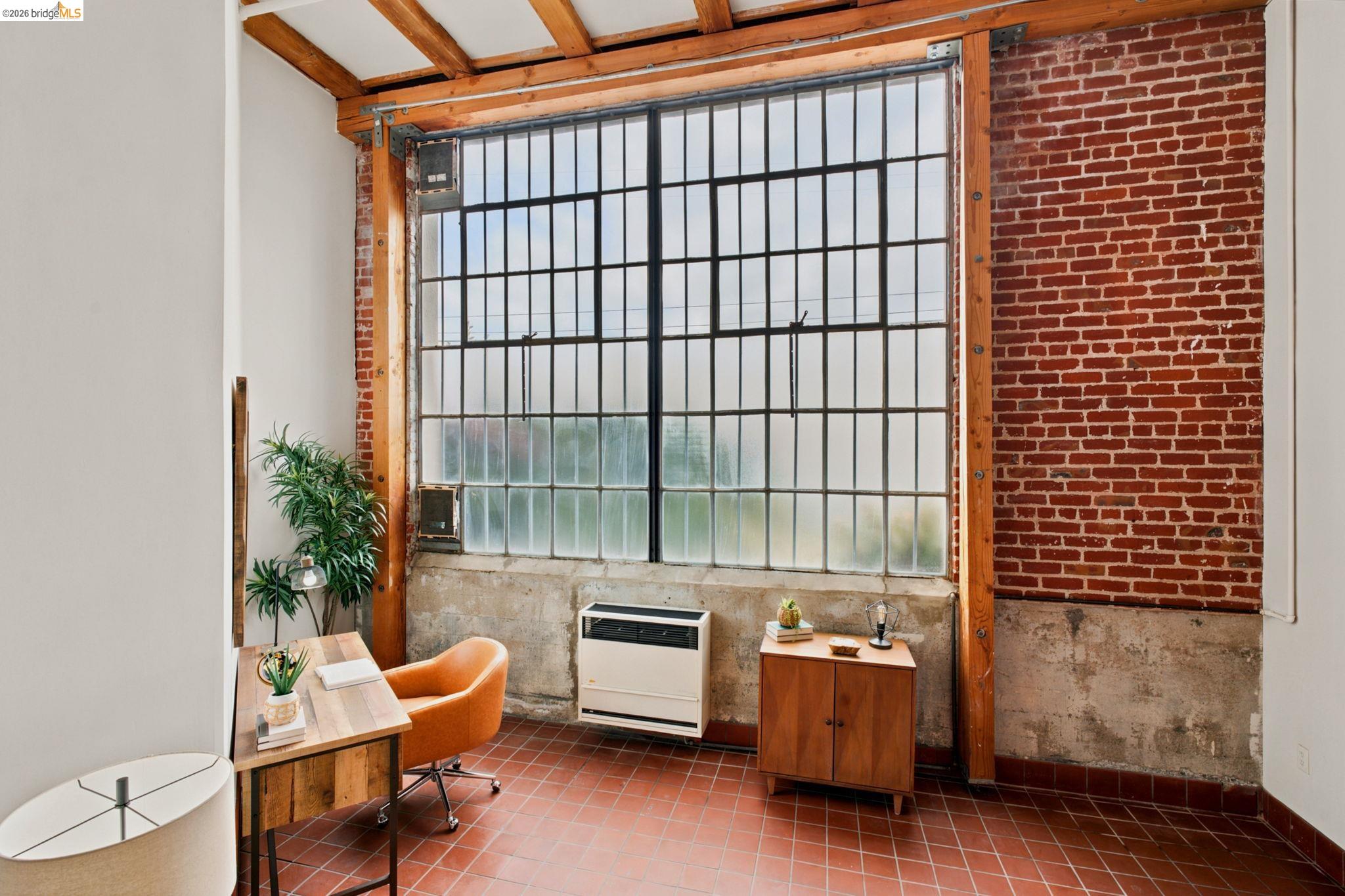 1920 Union Street, Unit 9 Oakland, CA 94607 - Photo 13 of 35 Expansive industrial-style window wall providing significant natural light