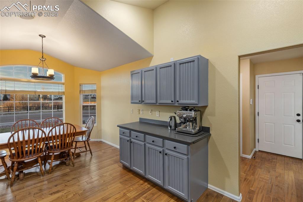 9015 Oakmont Road Peyton, CO 80831 - Photo 9 of 44 a kitchen that has a sink and chair