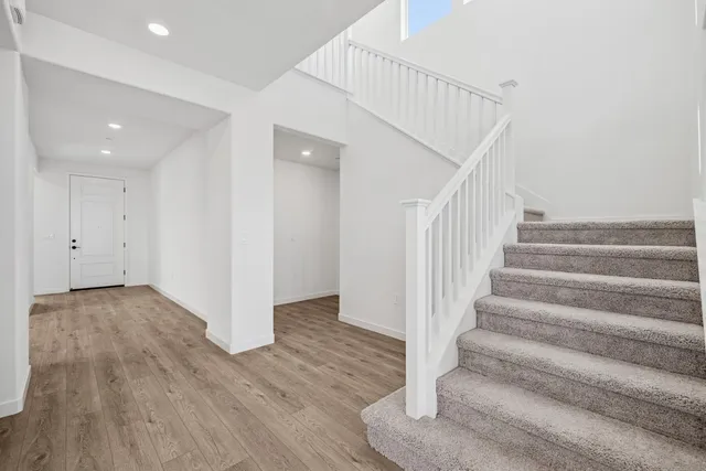 a view of entryway with wooden floor