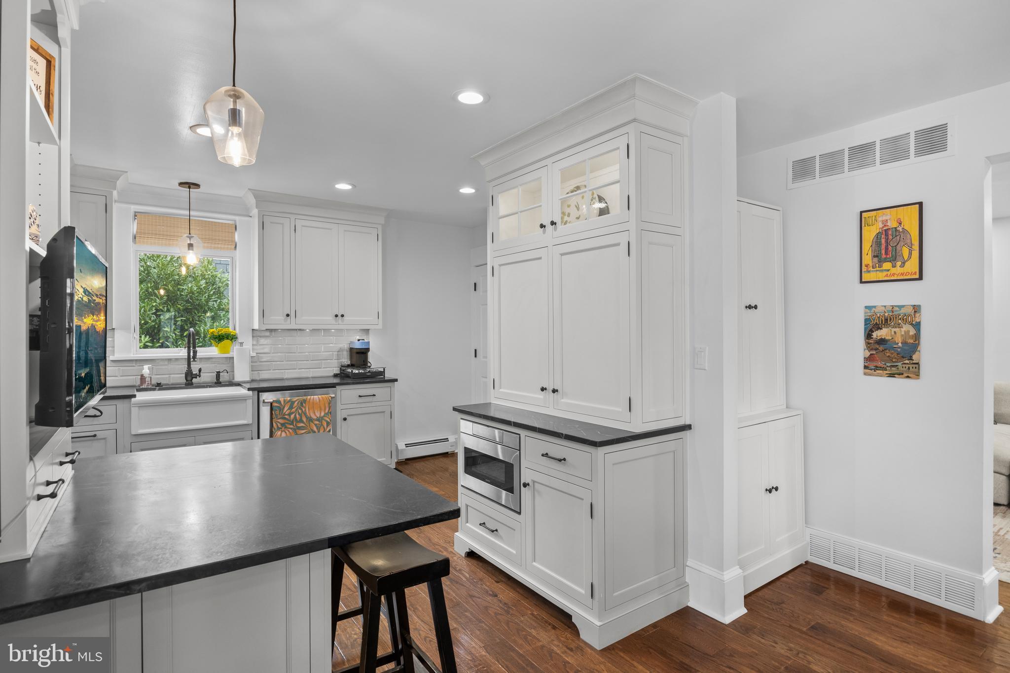 155 Rhoads Avenue Haddonfield, NJ 08033 - Photo 15 of 47 a kitchen with stainless steel appliances granite countertop a sink a stove and a refrigerator