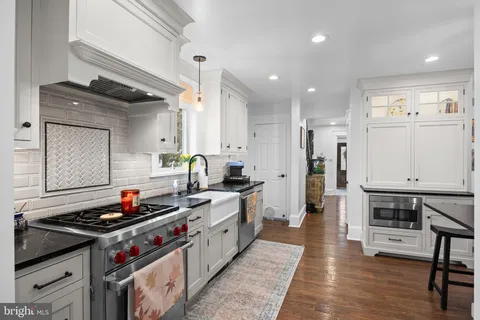 a bathroom with a toilet and a sink