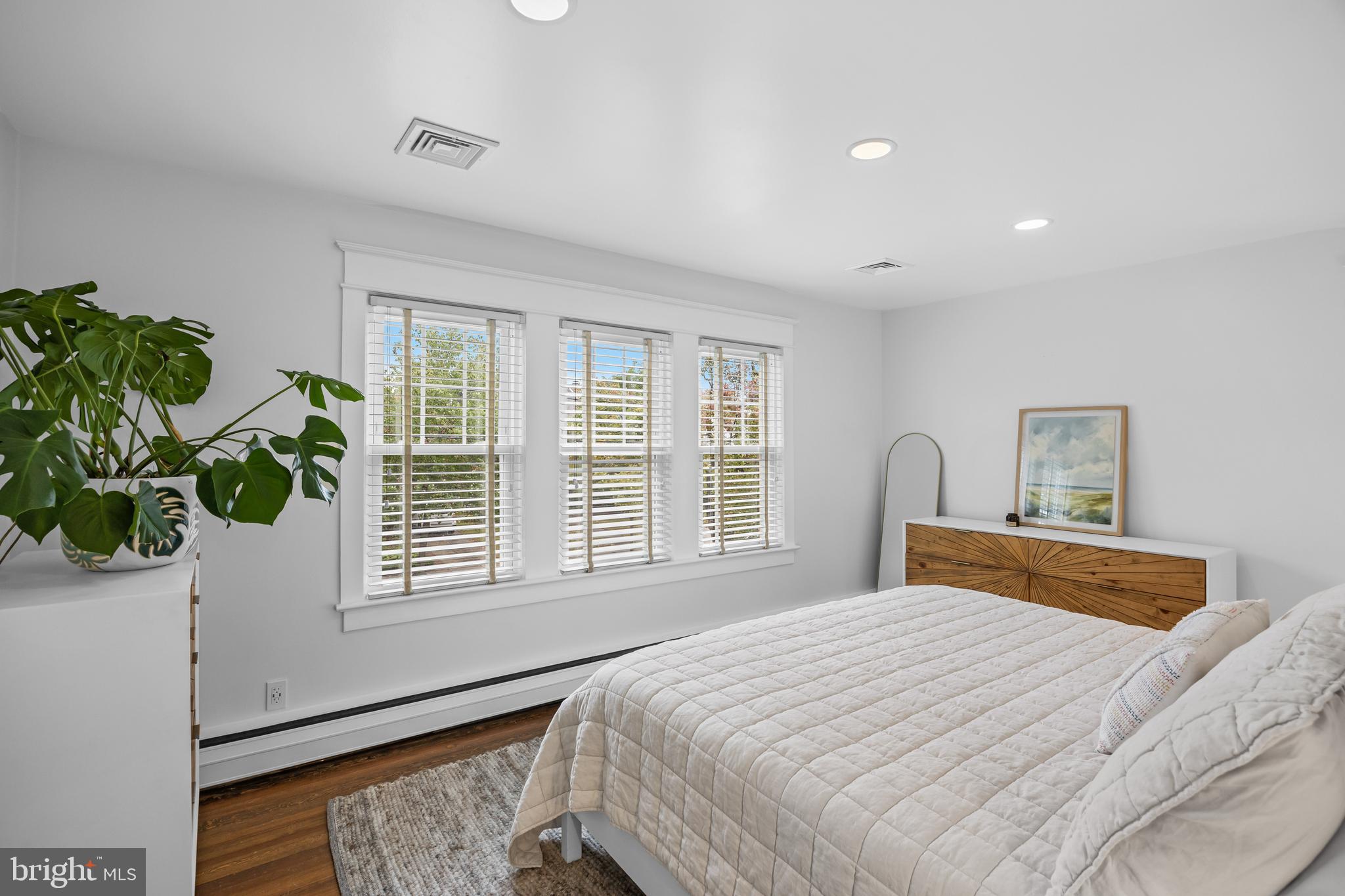 155 Rhoads Avenue Haddonfield, NJ 08033 - Photo 22 of 47 a bedroom with a bed and a window