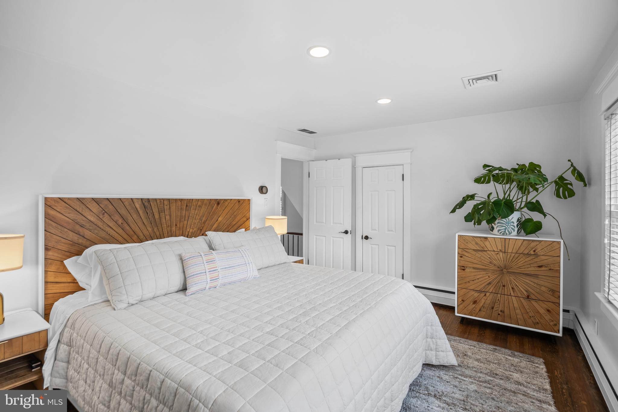 155 Rhoads Avenue Haddonfield, NJ 08033 - Photo 23 of 47 a bedroom with a large bed and a couch