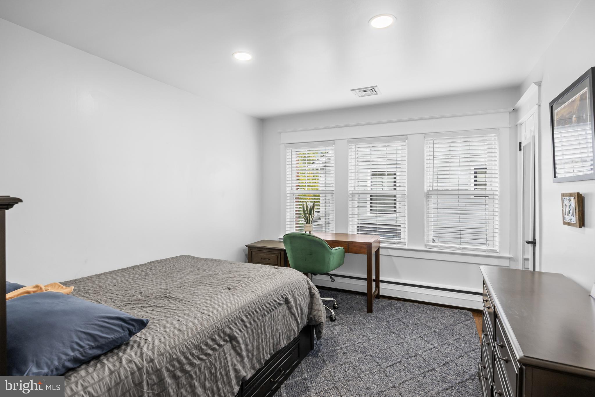 155 Rhoads Avenue Haddonfield, NJ 08033 - Photo 25 of 47 a bedroom with a bed chair and a window