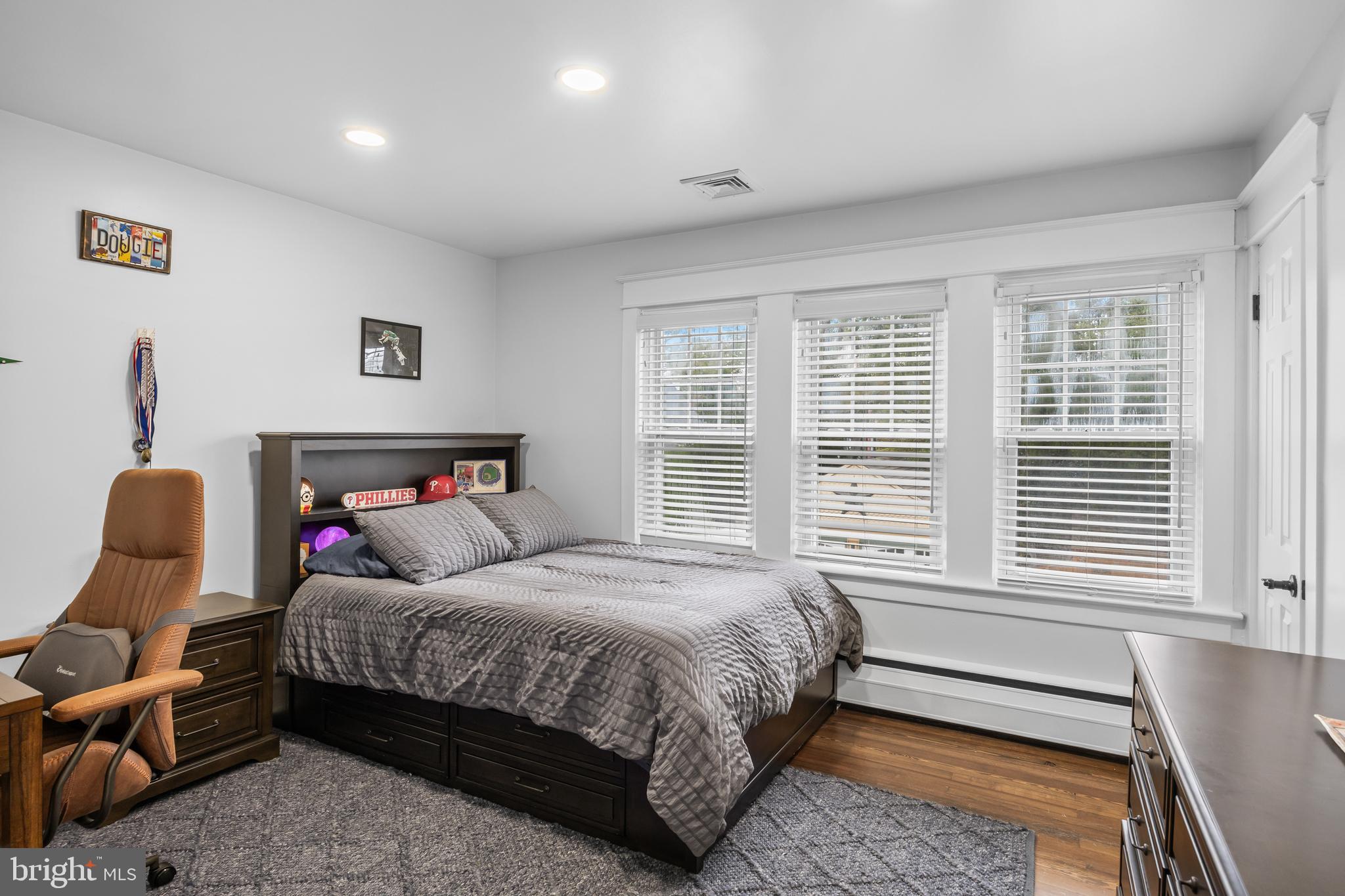 155 Rhoads Avenue Haddonfield, NJ 08033 - Photo 26 of 47 a bedroom with a bed and wooden floor