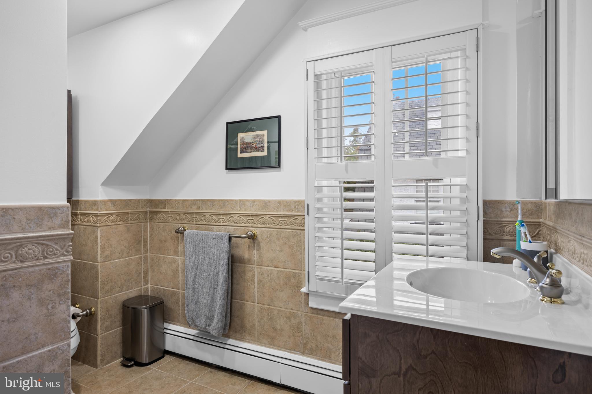 155 Rhoads Avenue Haddonfield, NJ 08033 - Photo 27 of 47 a bathroom with a sink and a mirror