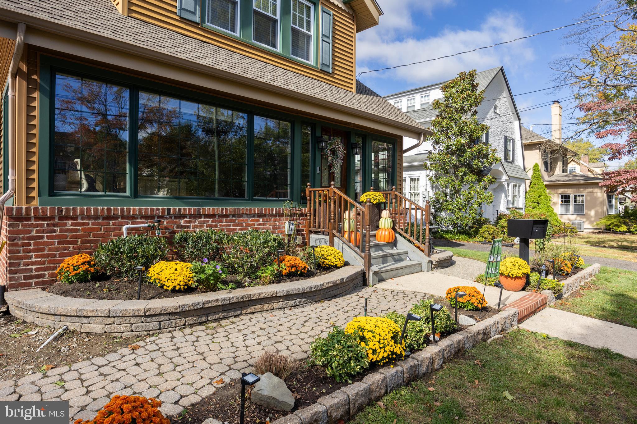 155 Rhoads Avenue Haddonfield, NJ 08033 - Photo 3 of 47 front view of a house with a swimming pool