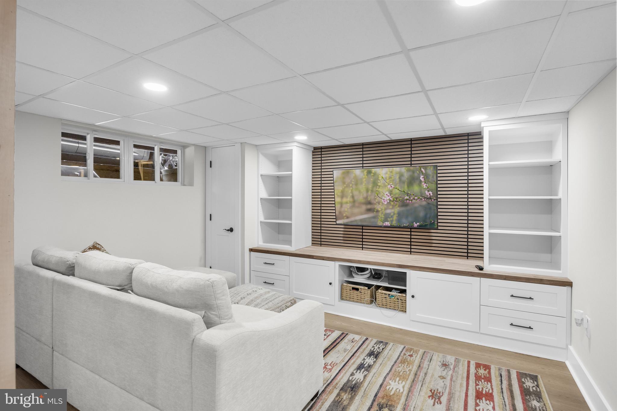 155 Rhoads Avenue Haddonfield, NJ 08033 - Photo 31 of 47 a living room with furniture and a window