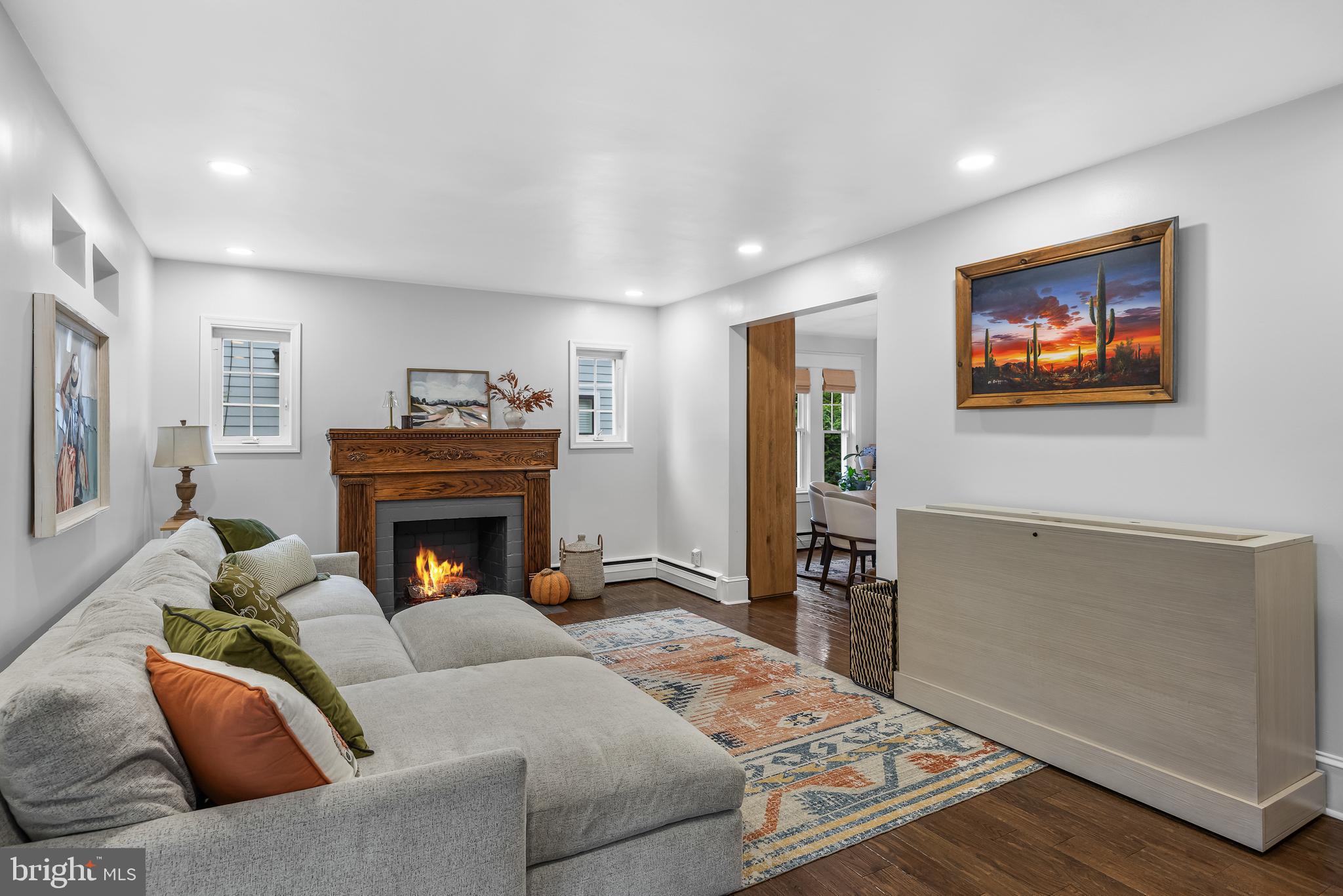 155 Rhoads Avenue Haddonfield, NJ 08033 - Photo 7 of 47 a living room with furniture and a fireplace