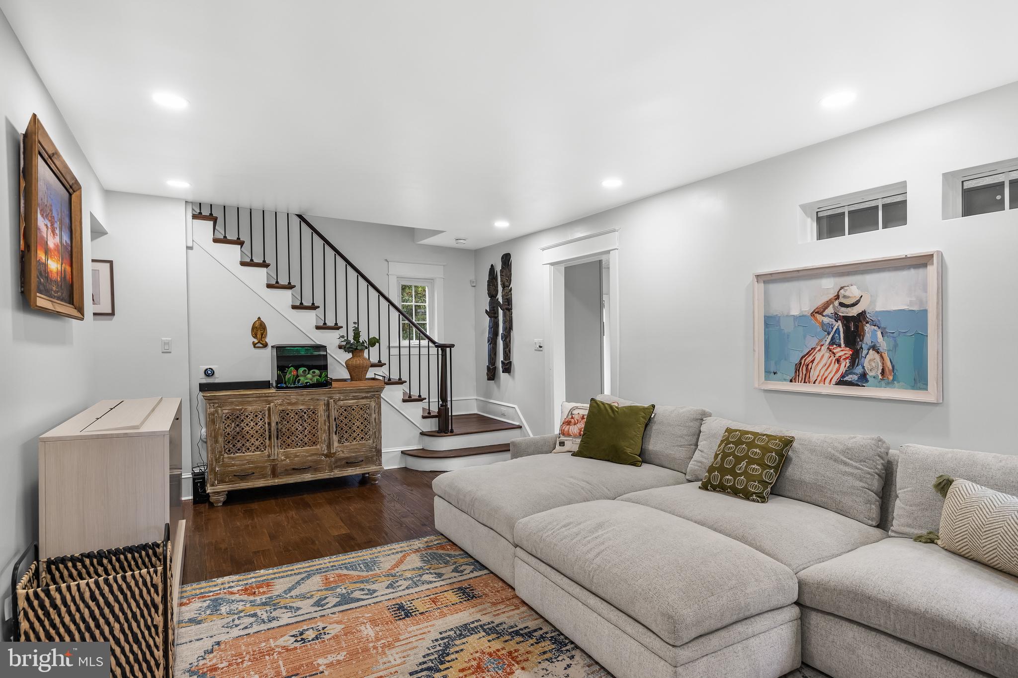 155 Rhoads Avenue Haddonfield, NJ 08033 - Photo 9 of 47 a living room with furniture and stairs