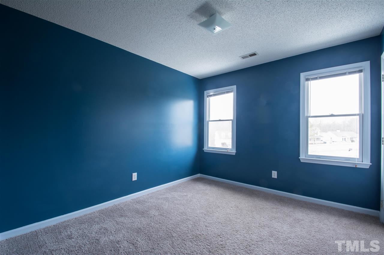 500 Jordan Ridge Lane Raleigh, NC 27603 - Photo 11 of 12 an empty room with a window