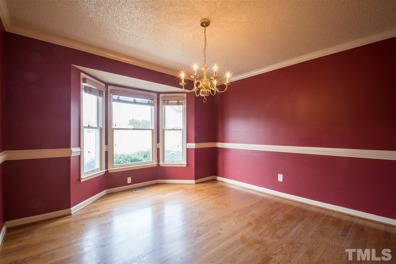 500 Jordan Ridge Lane Raleigh, NC 27603 - Photo 6 of 12 a view of empty room with window and wooden floor