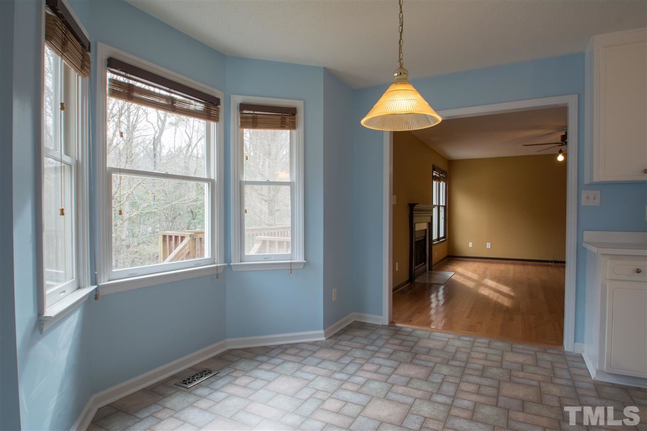 500 Jordan Ridge Lane Raleigh, NC 27603 - Photo 9 of 12 a view of a room with a chandelier and entryway