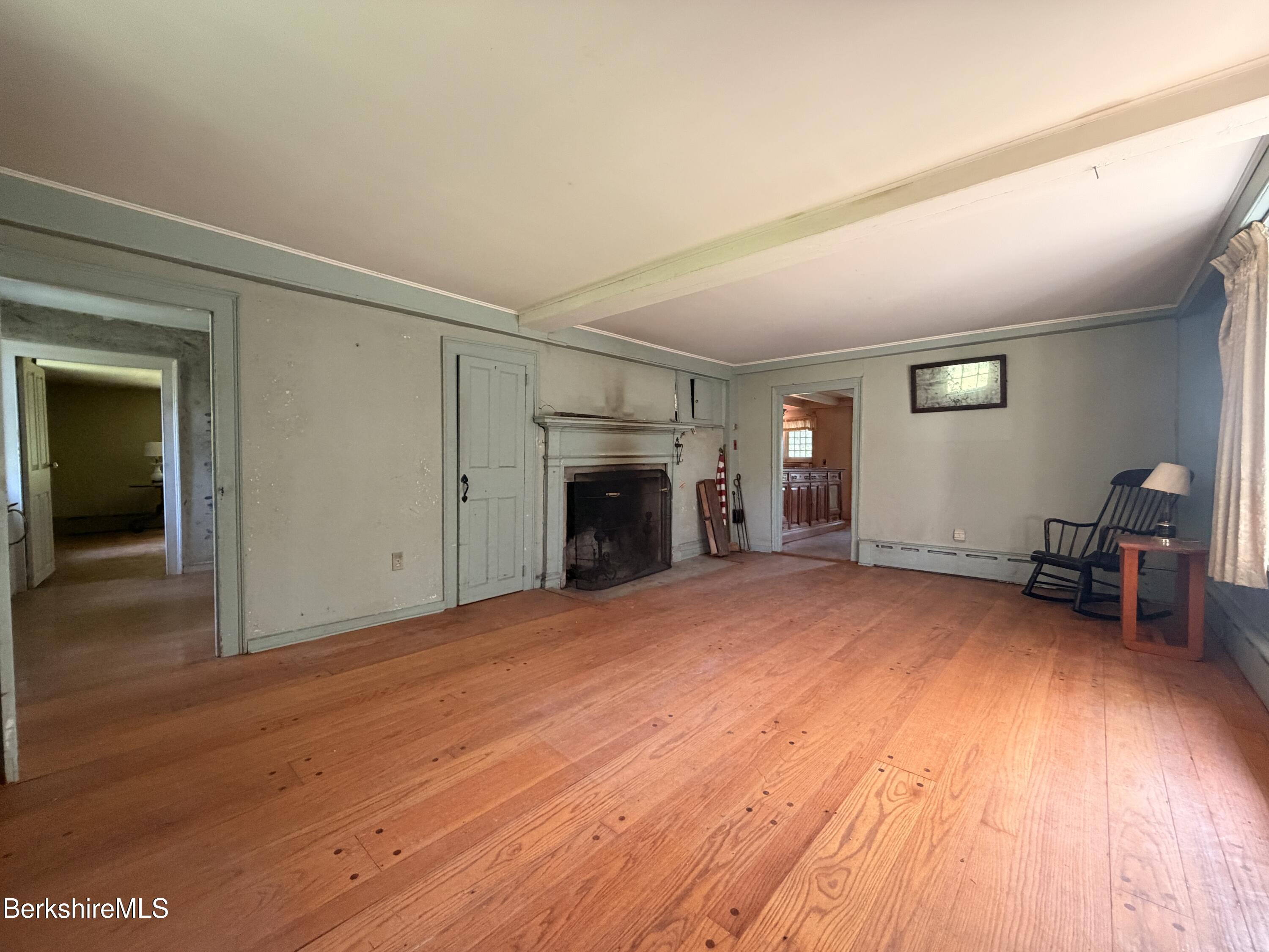 254 Main Street Sheffield, MA 01257 - Photo 7 of 13 a view of empty room with wooden floor and furniture