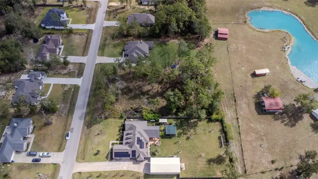 an aerial view of waterside residential houses