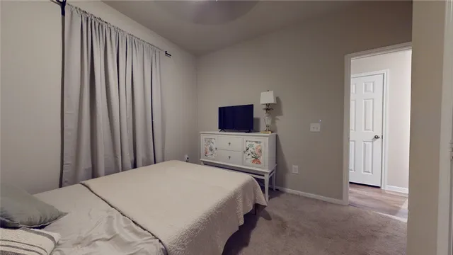 an aerial view of a house with a bed