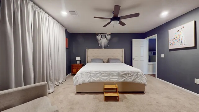 a bathroom with a sink a mirror and a toilet