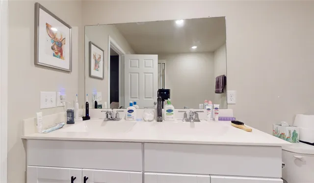 a living room with furniture and a rug