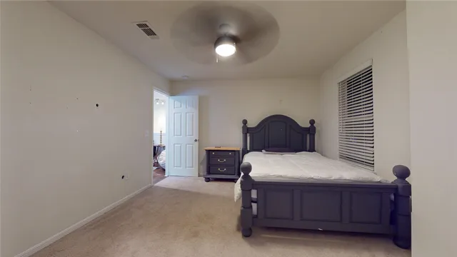 a workspace with furniture and painting on the wall