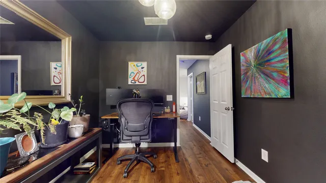 a view of a house with backyard and a patio