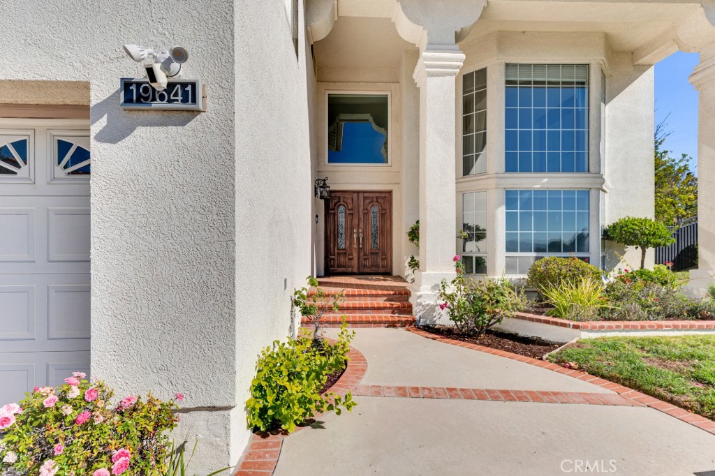 19641 Falcon Ridge Way Porter Ranch, CA 91326 - Photo 2 of 51 a front view of a house