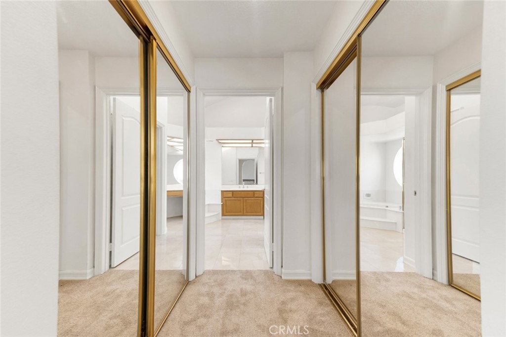 19641 Falcon Ridge Way Porter Ranch, CA 91326 - Photo 33 of 51 a view of a bathroom from a hallway