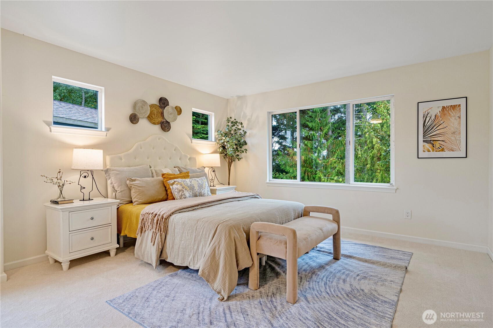 465 Field Place Northeast Renton, WA 98059 - Photo 18 of 25 a bedroom with a bed and a table