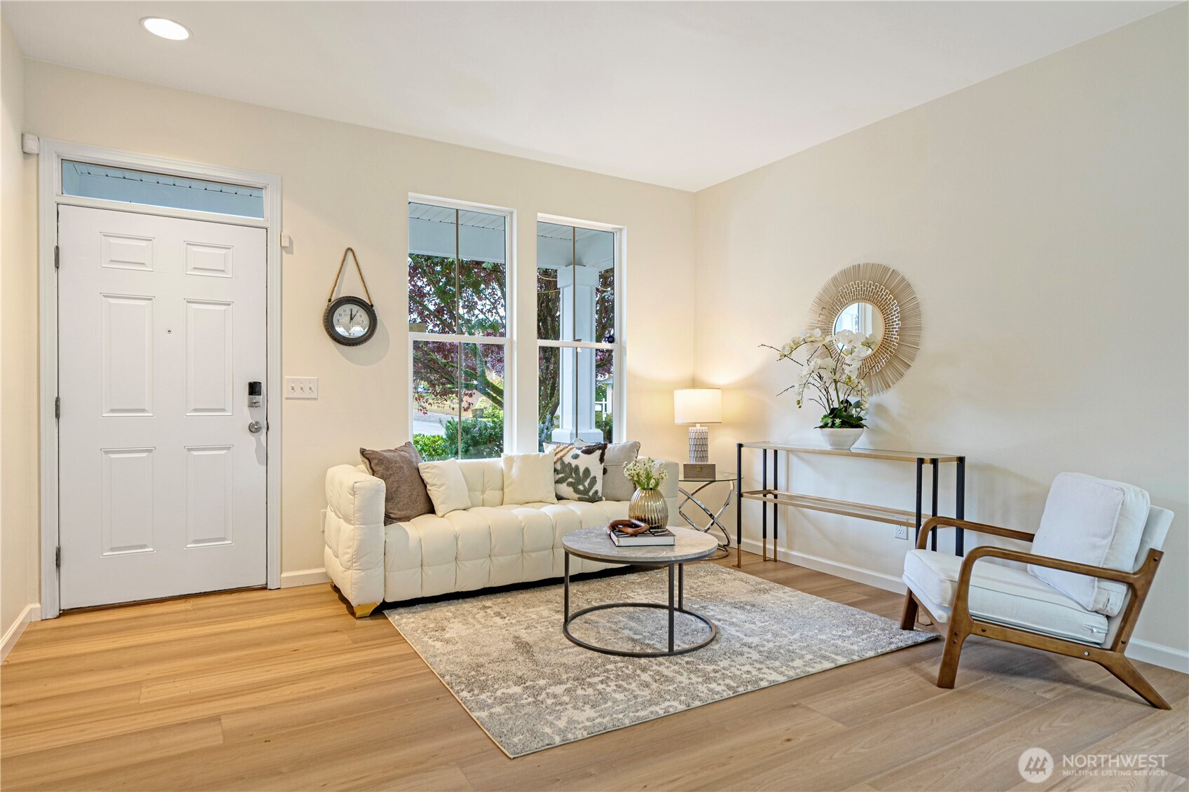 465 Field Place Northeast Renton, WA 98059 - Photo 2 of 25 a living room with furniture and wooden floor