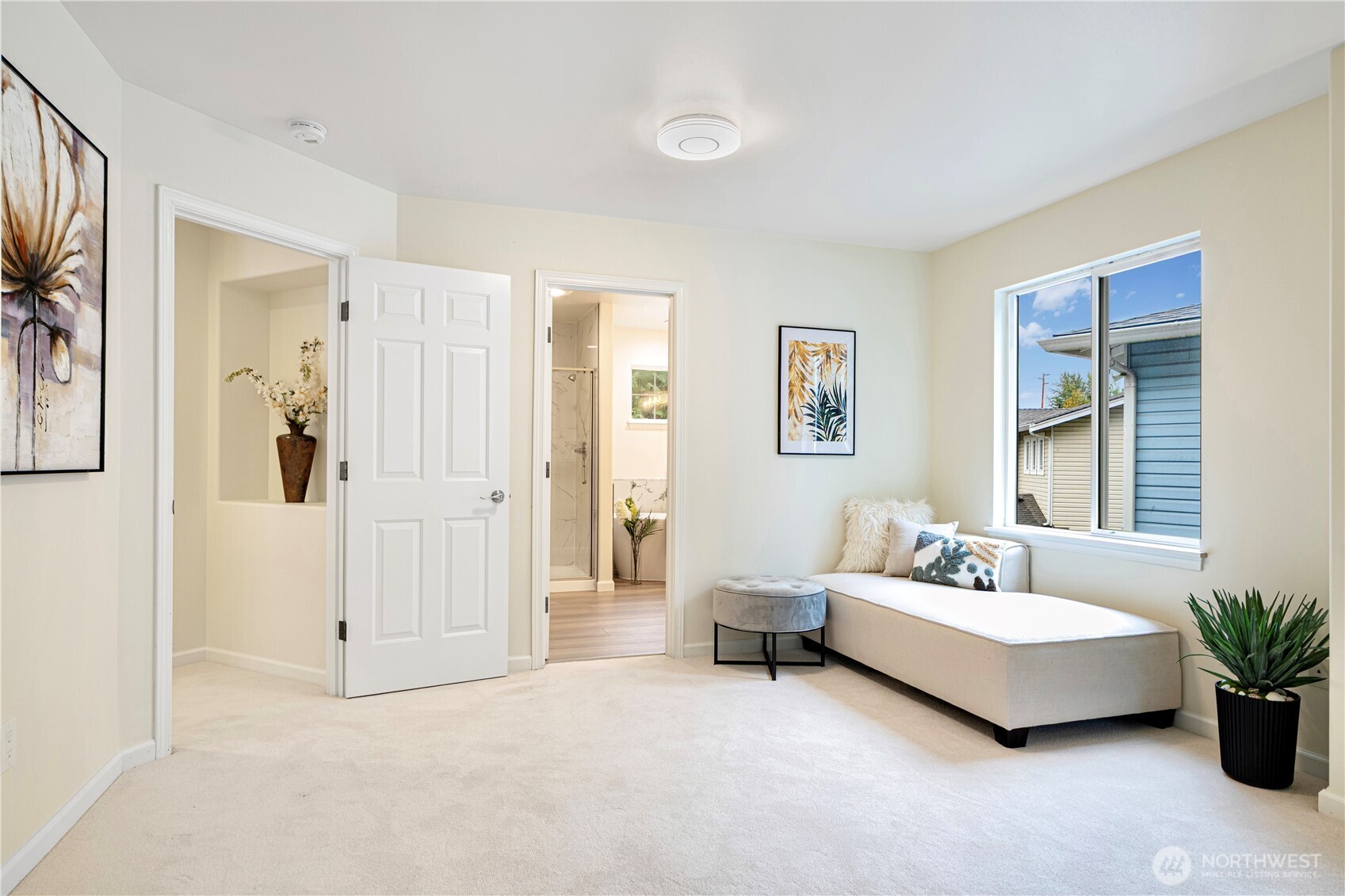 465 Field Place Northeast Renton, WA 98059 - Photo 23 of 25 a spacious bedroom with a bed and a couch