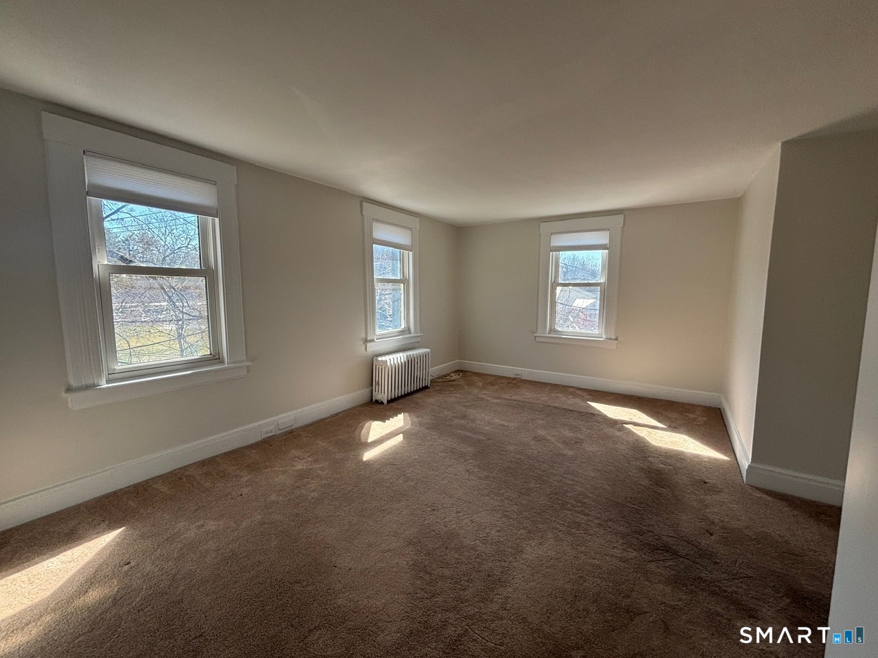 243 Glenville Road Greenwich, CT 06831 - Photo 2 of 10 a view of empty room with windows