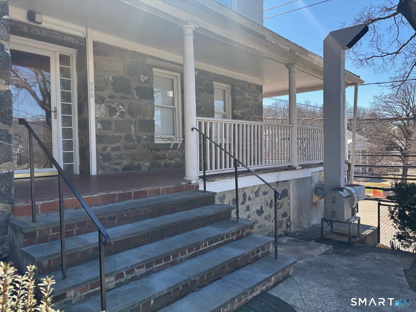 243 Glenville Road Greenwich, CT 06831 - Photo 9 of 10 a view of staircase with a rug