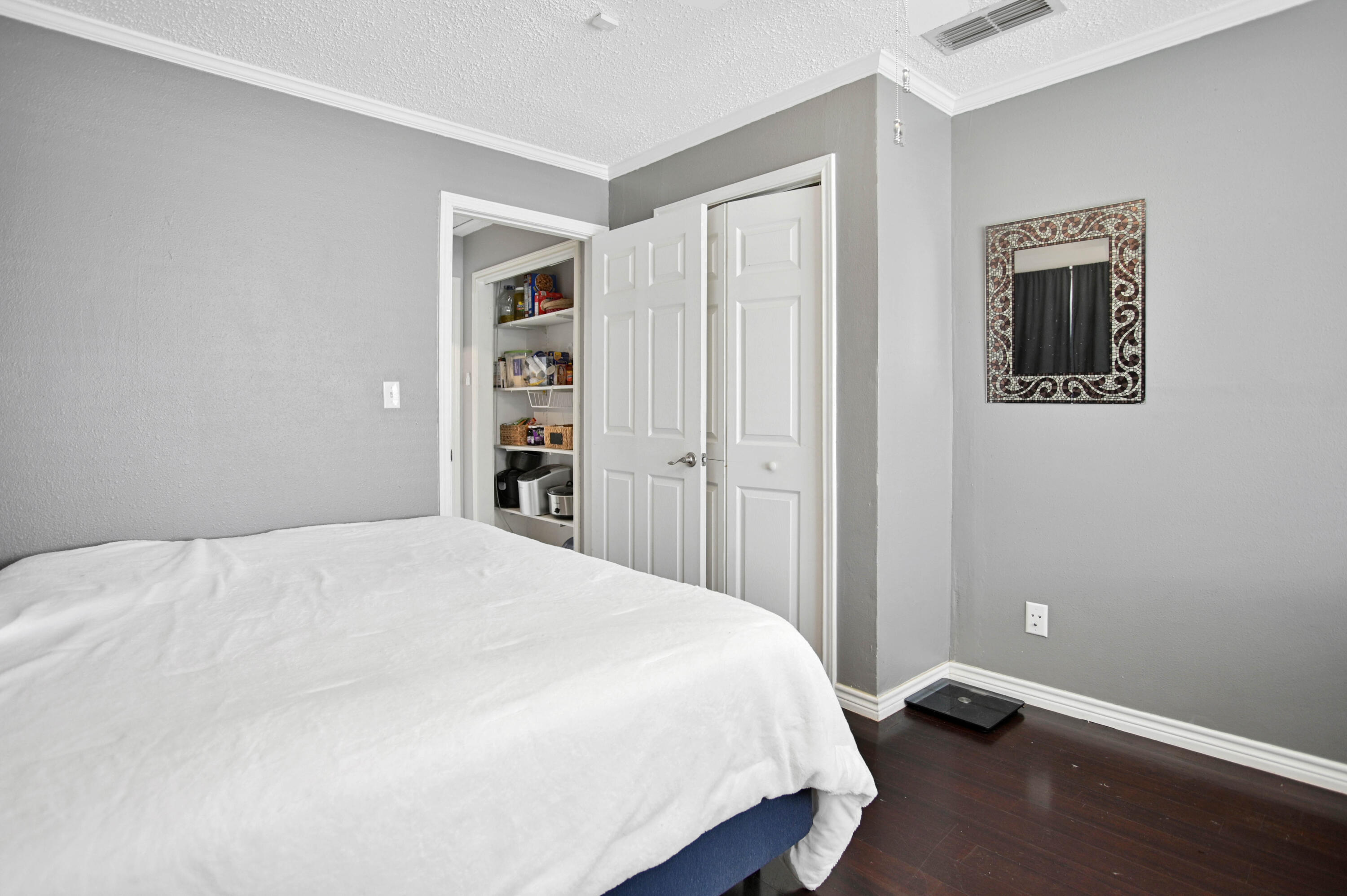 4102 32nd Street Lubbock, TX 79410 - Photo 19 of 40 a bedroom with a bed and a window