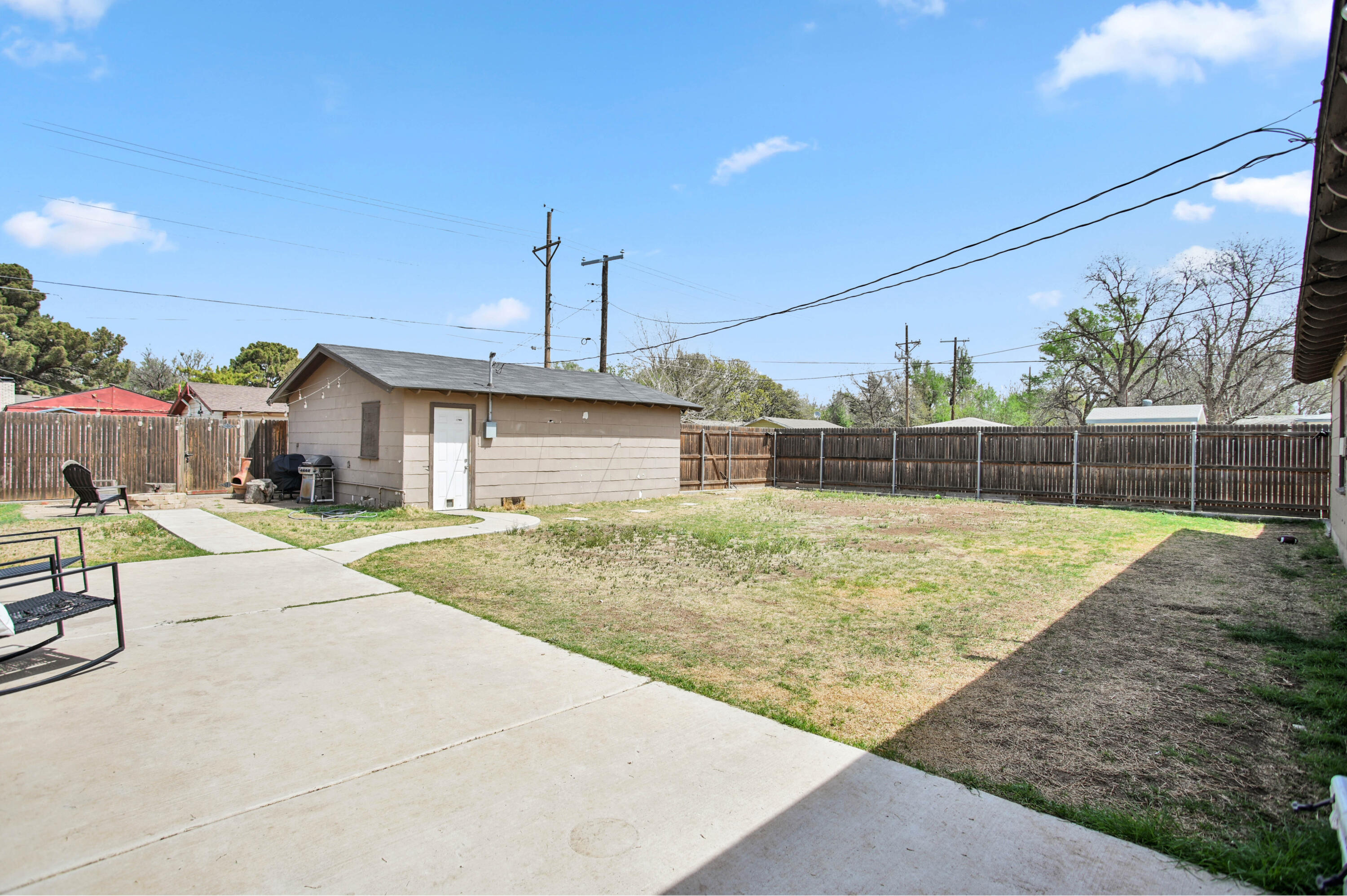 4102 32nd Street Lubbock, TX 79410 - Photo 31 of 40 a front view of a house with a yard