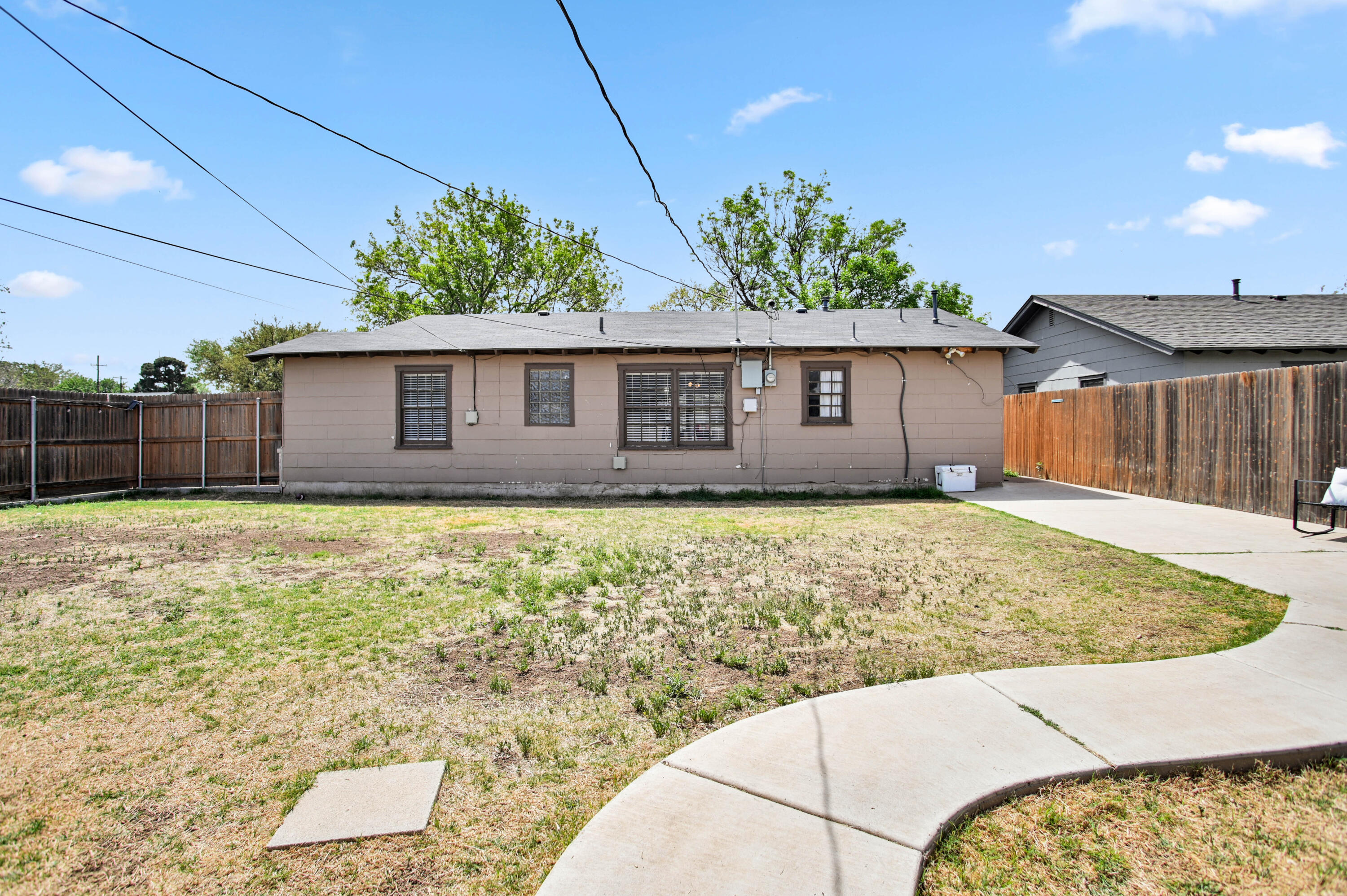 4102 32nd Street Lubbock, TX 79410 - Photo 35 of 40 a house view with a backyard space