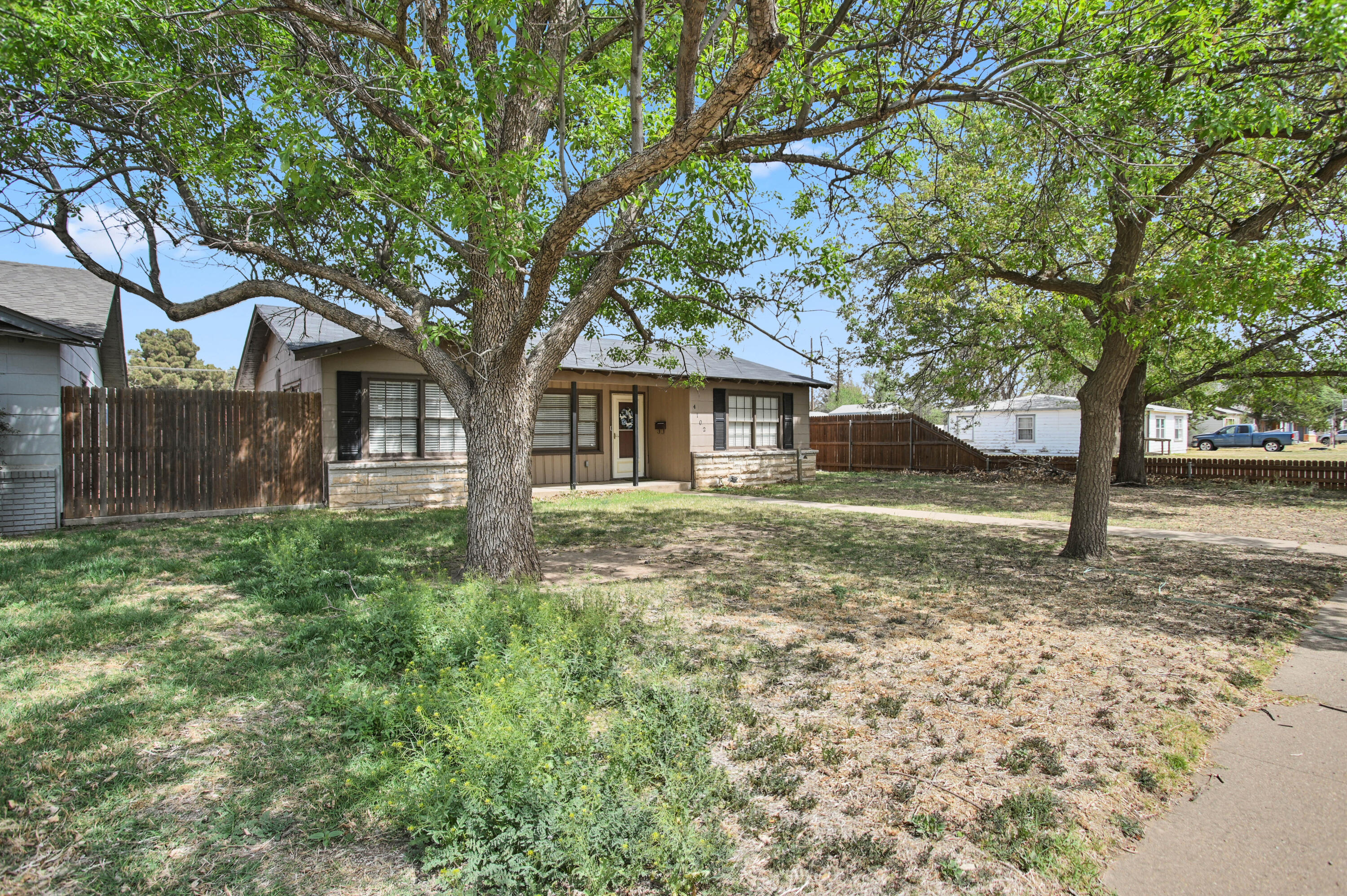 4102 32nd Street Lubbock, TX 79410 - Photo 40 of 40 a front view of a house with garden