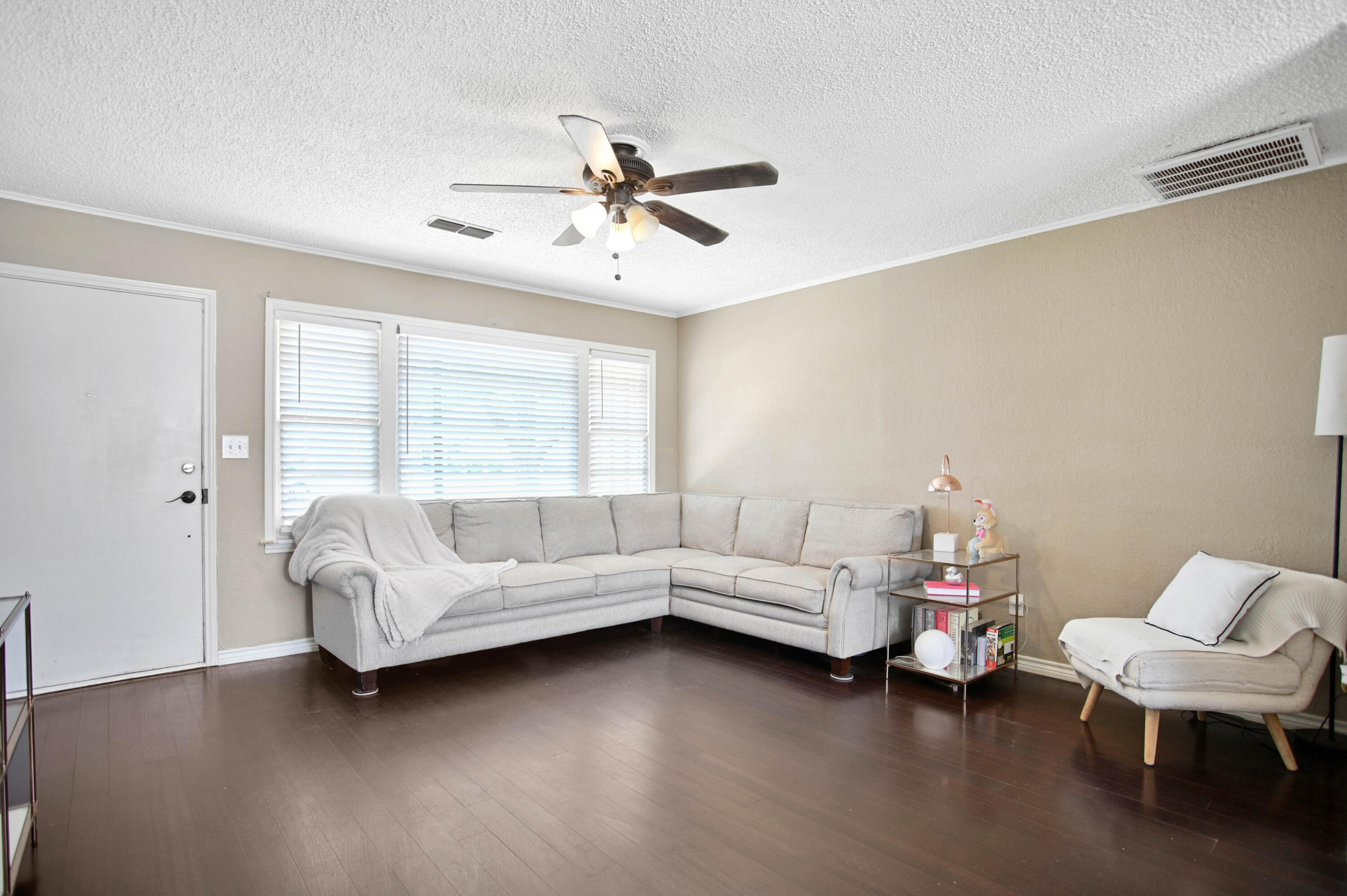 4102 32nd Street Lubbock, TX 79410 - Photo 6 of 40 a living room with furniture and a large window