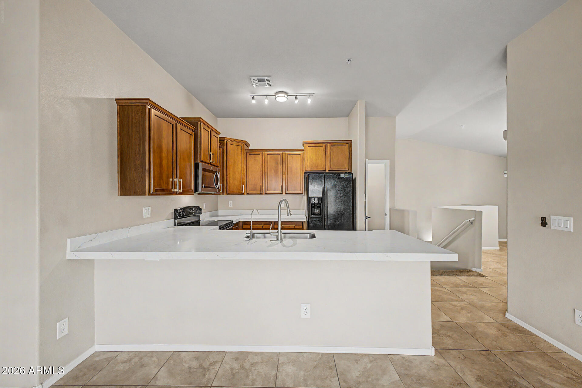 2725 East Mine Creek Road, Unit 2172 Phoenix, AZ 85024 - Photo 5 of 28 a utility room with faucet washer and dryer