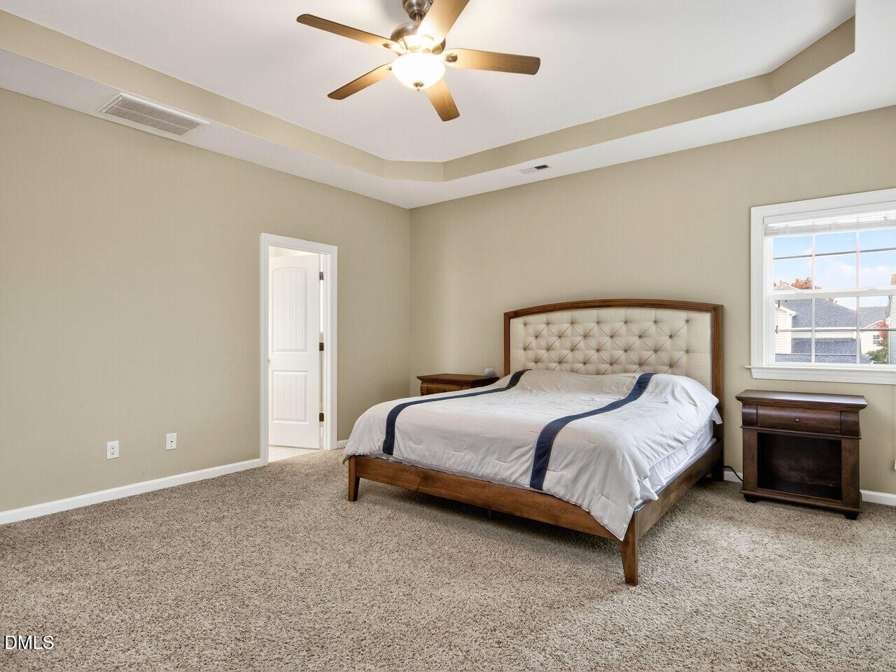 1133 Chapanoke Road Raleigh, NC 27603 - Photo 18 of 48 a bedroom with a bed and window