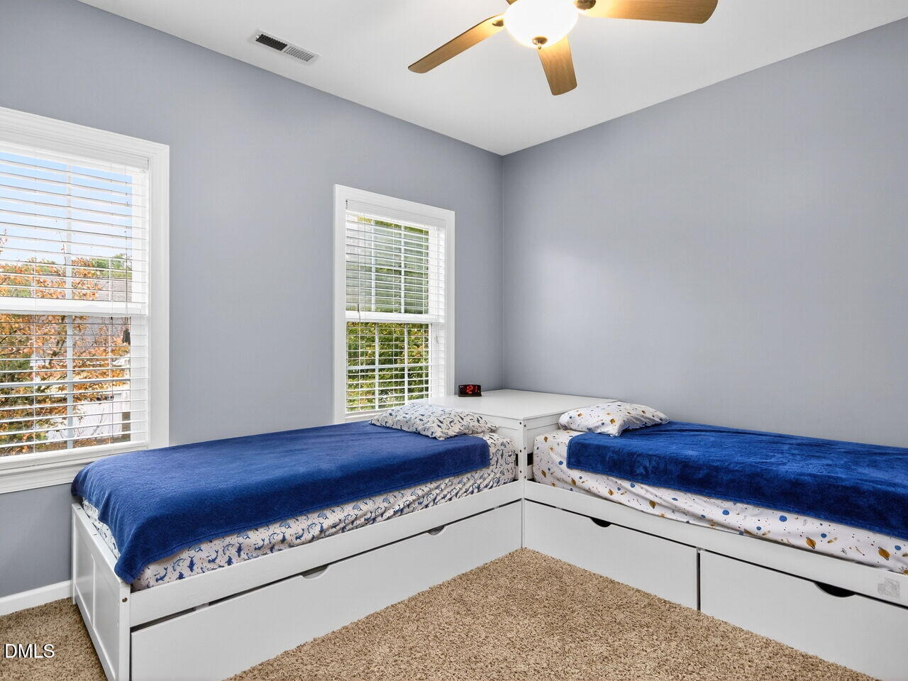 1133 Chapanoke Road Raleigh, NC 27603 - Photo 24 of 48 a spacious bedroom with a bed and a window