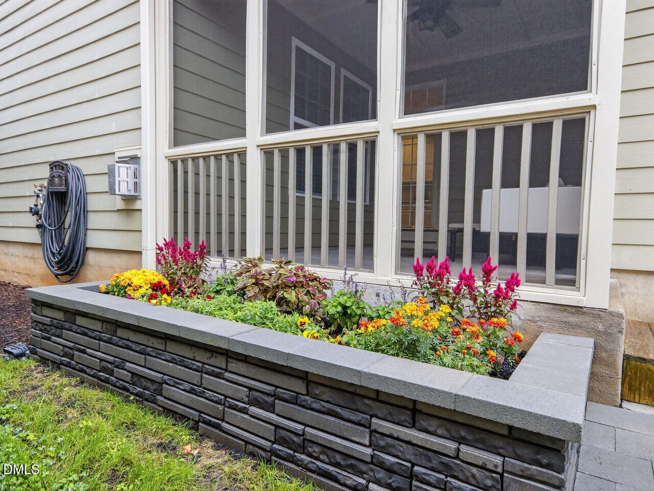 1133 Chapanoke Road Raleigh, NC 27603 - Photo 35 of 48 a bunch of flowers and flowers outside a garden