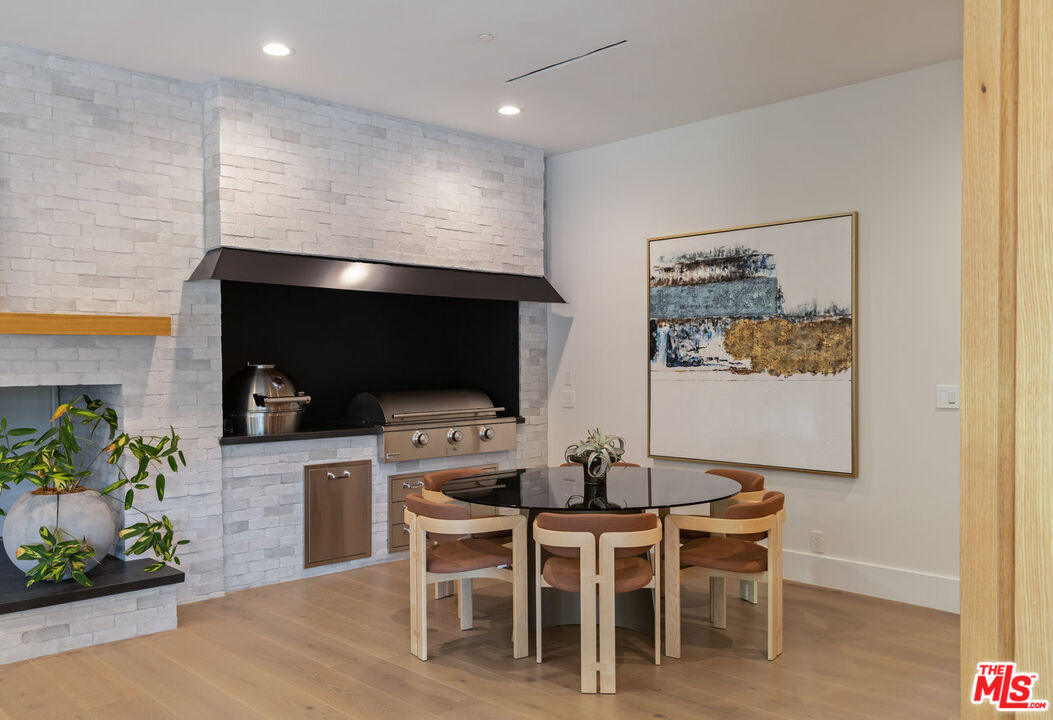 7052 Dume Drive Malibu, CA 90265 - Photo 26 of 52 a view of a dining room with furniture