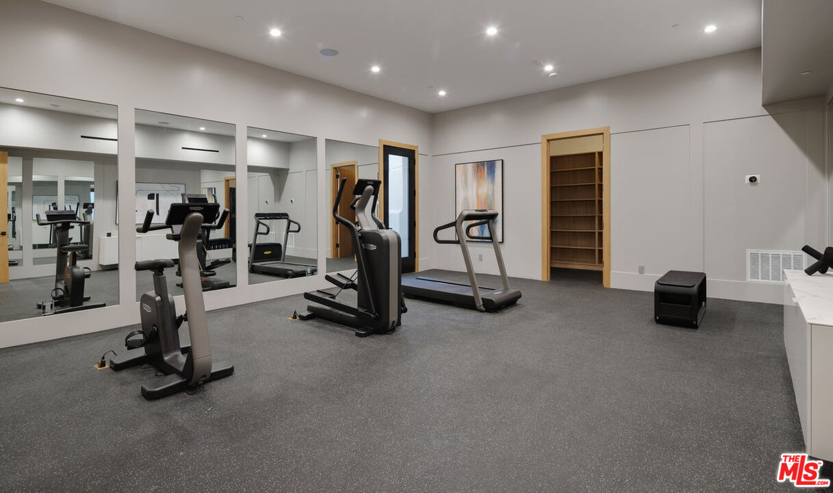 7052 Dume Drive Malibu, CA 90265 - Photo 46 of 52 a view of a room with gym equipment