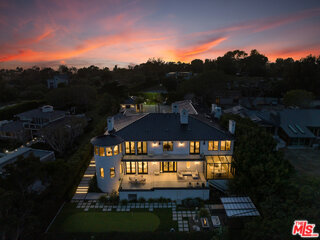 7052 Dume Drive Malibu, CA 90265 - Photo 52 of 52 a view of swimming pool and a yard in back