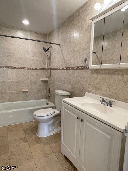 6 River Road, Unit K Nutley, NJ 07110 - Photo 13 of 21 a bathroom with a sink a toilet and shower