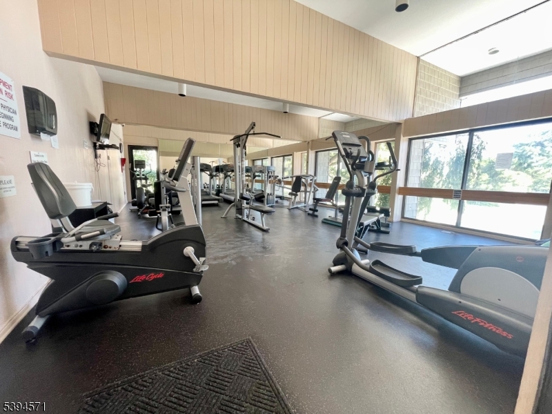 6 River Road, Unit K Nutley, NJ 07110 - Photo 18 of 21 a view of a room with gym equipment
